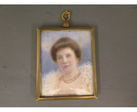 A miniature portrait of a classical lady in a rectangular gilt frame - 6.5cm x 5.5cm 