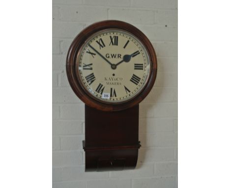A mahogany drop dial wall clock with a tapering chain driven fusee movement and 12 inch repainted dial signed Kay & Co makers