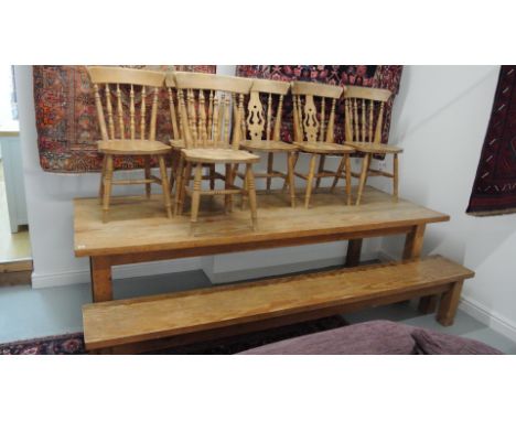 A large pine table - Height 78cm x 98cm x 260cm - with matching bench and six chairs - 2 + 4 - top loose for transport