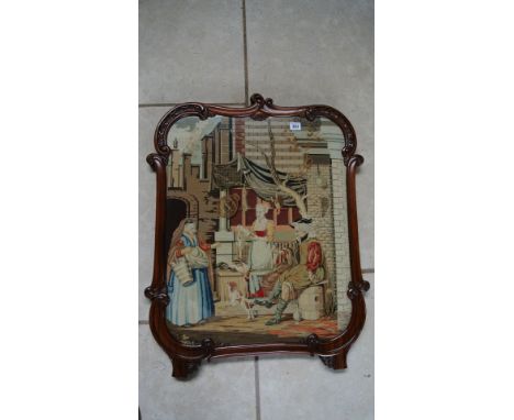 A tapestry screen in a carved mahogany frame - 61cm x 79cm