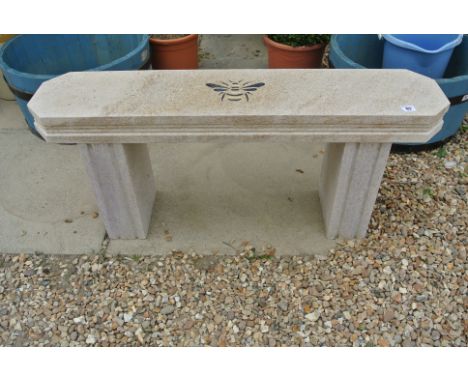 A limestone bench with hand carved and painted bee design on top - Length 100cm