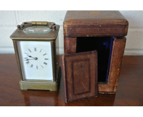 A large French carriage clock with 8 day platform movement with case and key - Height 14cm - working in the sale room