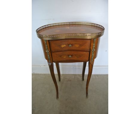 A 20th century continental two drawer bedside cabinet/lamp table - Height 73cm x 48cm x 27cm