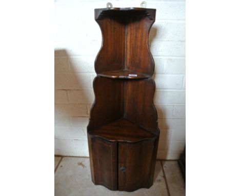 A mahogany hanging corner shelf and cupboard with boxwood inlay - Height 80cm