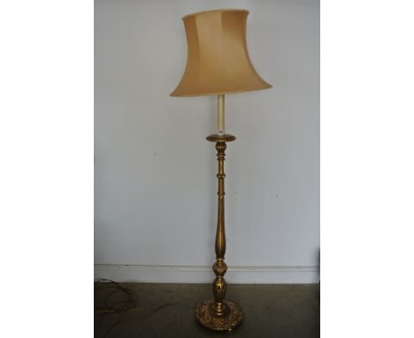A giltwood standard lamp with shade - Height 187cm