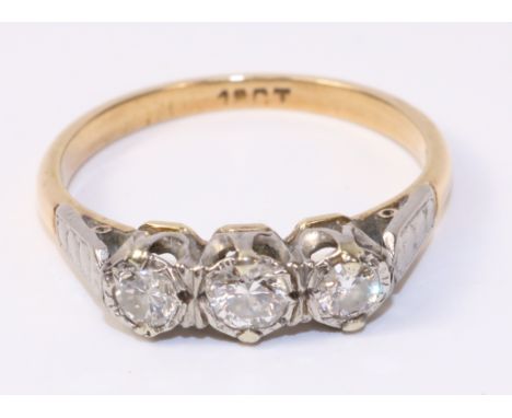 Three stone diamond gold ring stamped 18ct   Condition Report   Click here for further images, condition, auction times & del