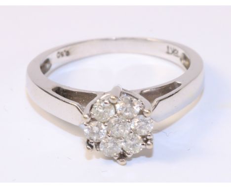 Diamond flower set ring stamped 18kt (size Q)   Condition Report   Click here for further images, condition, auction times & 