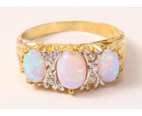 Gold-plated three stone opal ring   Condition Report   Click here for further images, condition, auction times & delivery cos