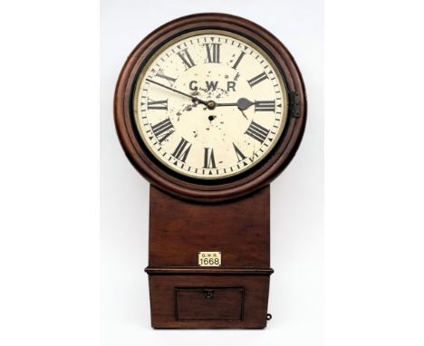 A GWR  mahogany cased single fusee station clock from Exeter St David's Station:, the enamel dial with Roman numerals signed 