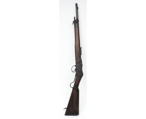 A .303 Martini Henry Action rifle by Enfield:, 53.3cm barrel with ladder rear sight, the left hand side of the receiver stamp