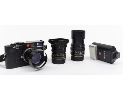 A Leica M6 Rangefinder TTL Film Camera in black with manual, and lenses, a 28mm F2.8 Elmarit M, a 50mm F2 Summicron, a 90mm F