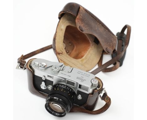 A Leica M3 35mm camera with Summilux 50mm 1.4 lens:, the camera stamped to body as per title and numbered '875 766, the lens 