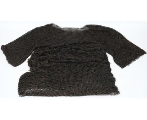 A knee length chain mail tunic:.