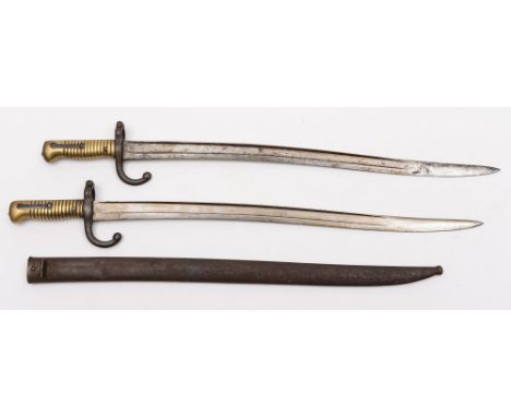 A 19th Century Chasse Pot French bayonet:, with brass ribbed handled and hooked quillon, 57.5cm single edged fullered blade, 