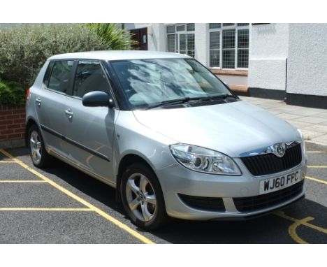 A Skoda Fabia TSI 1.2L:, registration no WJ60 FPC, petrol, 5 speed manual, 21,000 miles, cloth interior, radio/cd, climate co