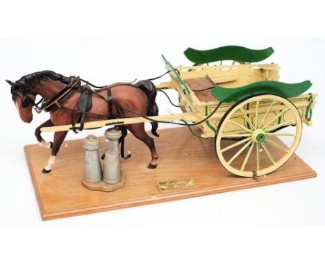 A Beswick model of a horse with a scale model 'Farm Dairy Float':, mounted on a wooden plinth, 49cm long