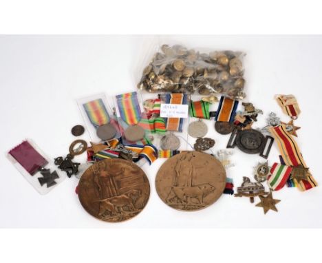 A WWI death plaque, to Edwin Elliot Phair: another death plaque worn and illegible, assorted WWI and WWII medals, and assorte