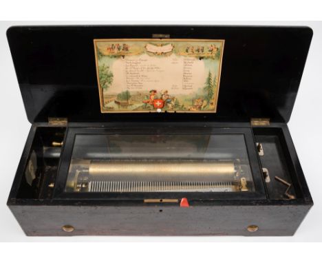 A 19th century Swiss rosewood musical box: playing twelve airs, with lever ratchet winding, 33cm. cylinder, change/repeat and