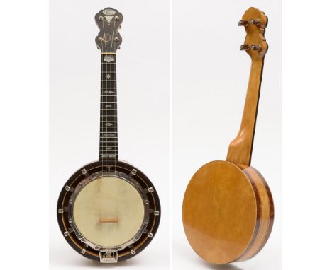 A satinwood and amboyna inlaid banjo ukulele by Alfred D Cammeyer, London:, mother of pearl inlaid headstock and rosewood fre