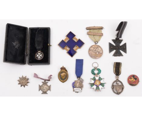 A silver and enamel SMRC marksman badges, an Army Temperance league medal, together with a collection of various other medals