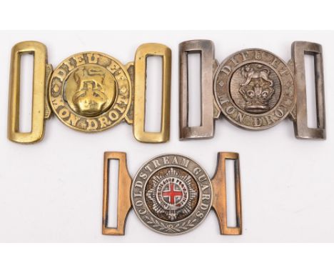 A British Army two piece brass belt buckle:, the lion passant above kings crown circled by the motto 'Dieu Et Mon Droit', tog