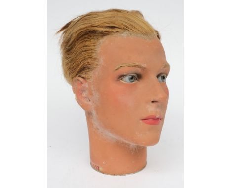 An early 20th century male wax mannequin head by P Imans, Paris:, signed as per title to neck and numbered S210.592, inset bl