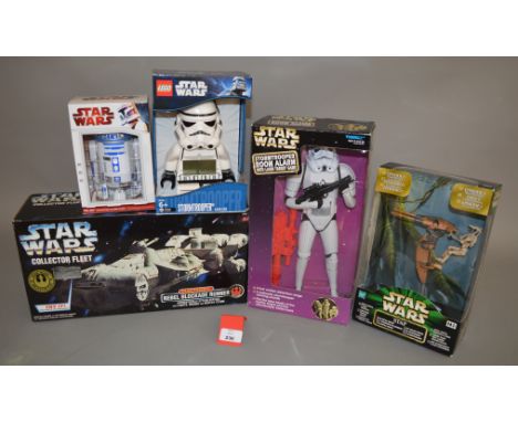 Five Star Wars items: Hasbro Collector Fleet Electronic Rebel Blockade Runner; Tiger Stormtrooper Room Alarm; Hasbro STAP; Le