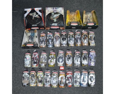 32 Hasbro Star Wars carded and boxed diecast vehicles and figures from the 'Titanium Series' including 'ARC 170 Starfighter' 