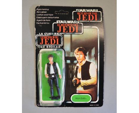 A vintage Star Wars carded 'Return of the Jedi' figure, 'Han Solo', large head, E figure in clear bubble  with some crushing 