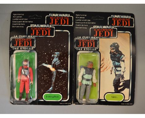 Two vintage Star Wars Tri-Logo 70 back carded Return of the Jedi figures, 'Nikto' E figure in clear bubble  on VG unpunched c
