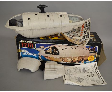 A boxed vintage Palitoy Star Wars 'Return of the Jedi' Rebel Transport Vehicle, the item has been opened and re-taped althoug