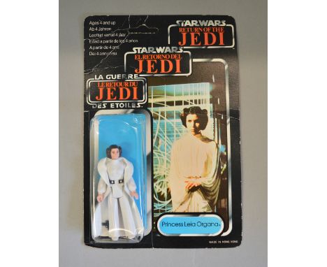 A vintage Star Wars carded 'Return of the Jedi' figure, 'Princess Leia Organa' E figure in clear bubble  with some crushing o