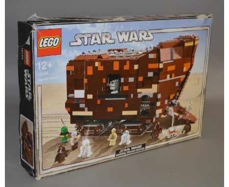 Lego Star Wars 10144  'Sandcrawler', in generally  F box, with crushing, tears and creasing. Box has been opened, item unchec