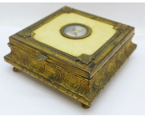 An early 20th Century Italian square jewel casket, hinged lid set with a roundel portrait 