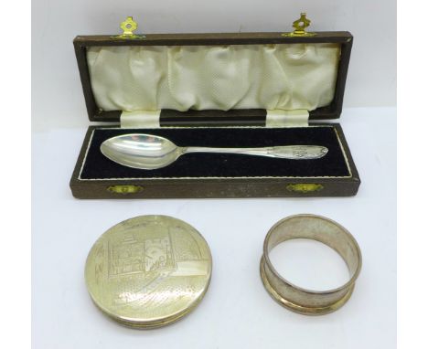 A silver spoon, napkin ring and compact marked 833, (spoon and napkin ring 30g) 