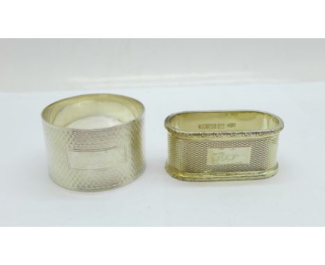 Two silver napkin rings, Mappin &amp; Webb, Birmingham 1983, and Harman Bros., Birmingham 1943, total weight 65g 