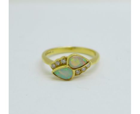 An 18ct gold, opal and diamond ring, 3.5g, M/N 