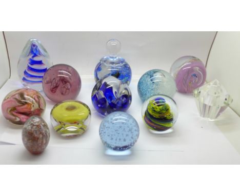 Twelve glass paperweights including Caithness and Phoenician Malta 
