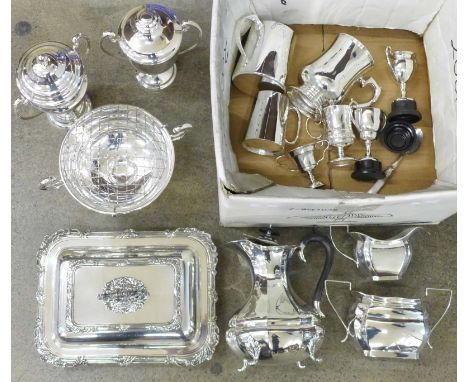 A box of silver plated items, rose bowl, four trophies, three piece tea service, tankards, etc. 