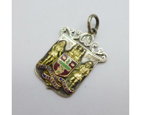 A silver and enamel Nottinghamshire Football Association fob medal, with inscription, 'Thursday Cup 1906', enamel a/f 