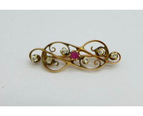 A yellow metal, diamond and ruby brooch, 3.6g, 35mm 