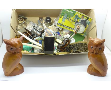 Assorted items; compass, wooden owls, compact, miniature instruments, etc. 