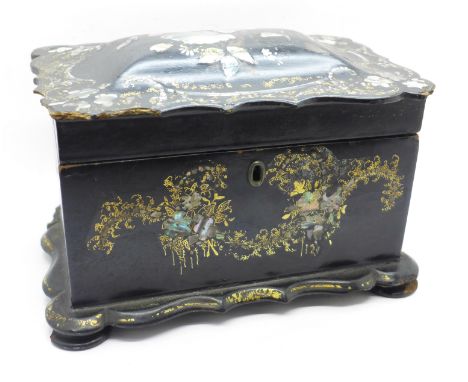 A 19th Century papier mache tea caddy inlaid with abalone, one foot replaced, a/f (small losses overall) 