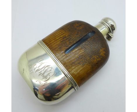 A leather covered glass hip flask, the sterling silver cup with monogram and date inscription, '1837-1907', cup 46g 