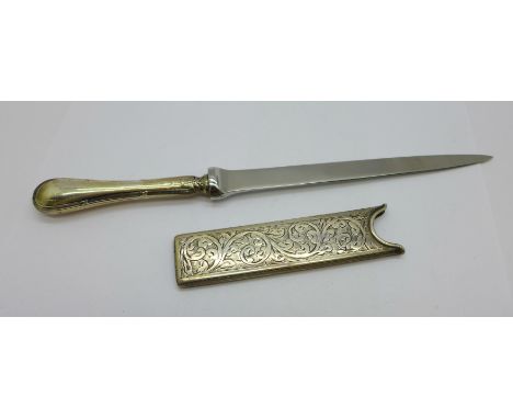 A silver handled letter opener and a silver comb case, Birmingham 1921 