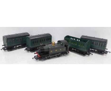 Four Hornby OO gauge railway carriages, one a/f and a Hornby GWR tank engine 