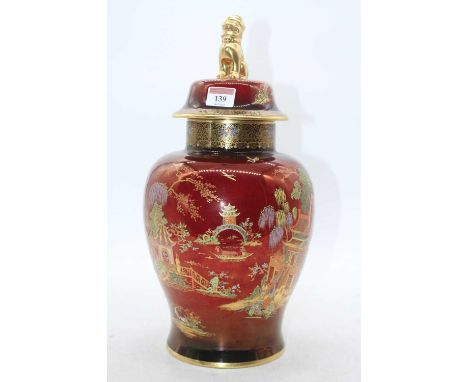 An early 20th century Carltonware Rouge Royal vase and cover of baluster form, typically decorated in the Chinese style, havi