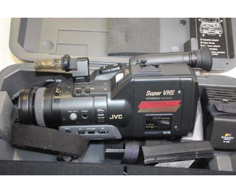 Four vintage video cameras, to include a Canon Canovision 8, a JVC videomovie and a Canon VC-10
