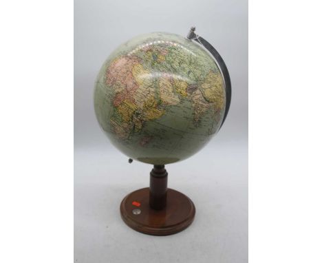 A mid-20th century terrestrial globe, on beech stand with integral compass, unmarked, approx h.53cmLight wear and fading thro