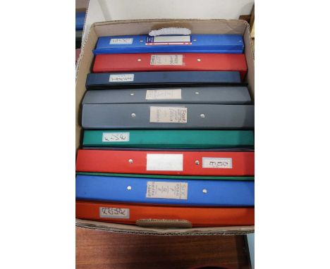 A collection of vintage stamps housed in folders